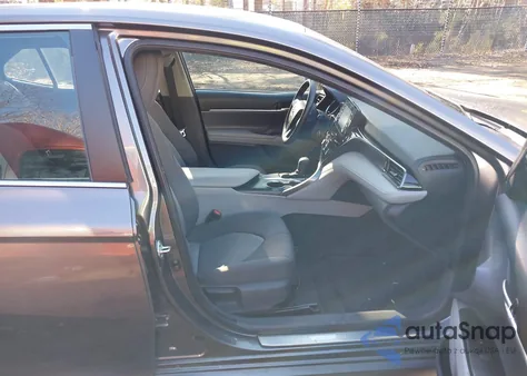 2021 Toyota Camry Le from USA, damaged, VIN 4T1C11AK5MU604069